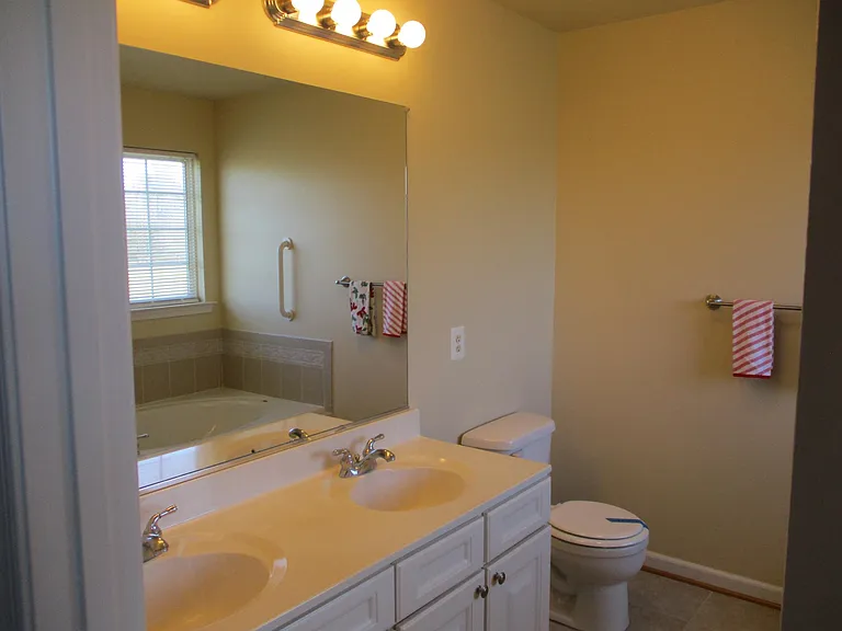 Opposite view of owner's bathroom