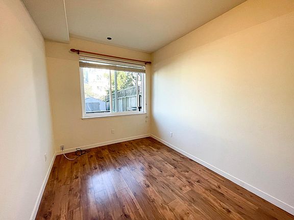 Bedroom with view of backyard