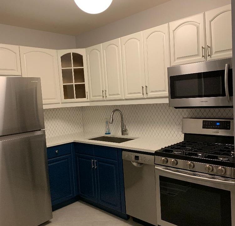 All new appliances, Bosch dishwasher, built-in dishwasher, Herringbone floor tile, Byzantine backsplash tile, Artemide lighting.