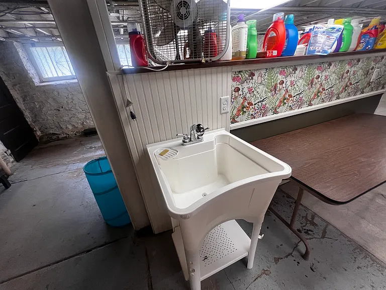 Utility sink in laundry room.
