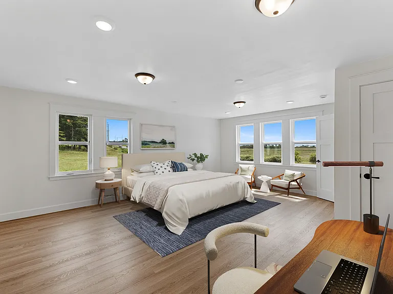 More peaceful views facing NE. All new custom windows keeping the home uniquely quiet.