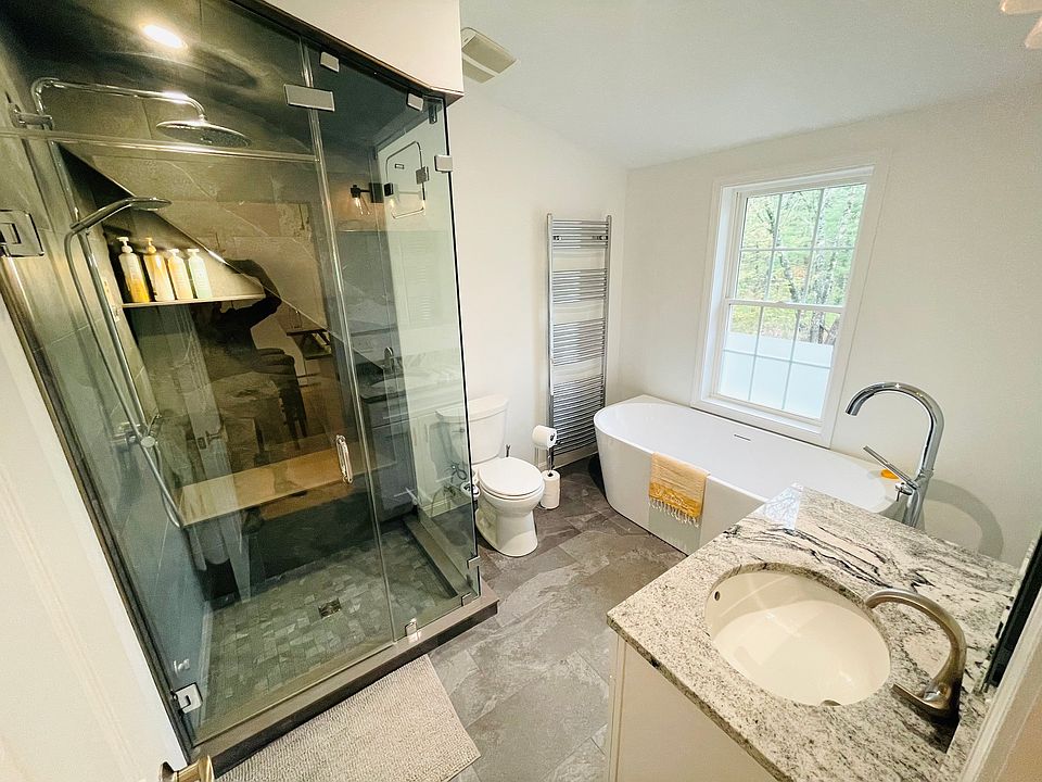 Bathroom: steam shower with rainshower head, extra large bathtub, heated floors, towel warmer, toilet with bidet