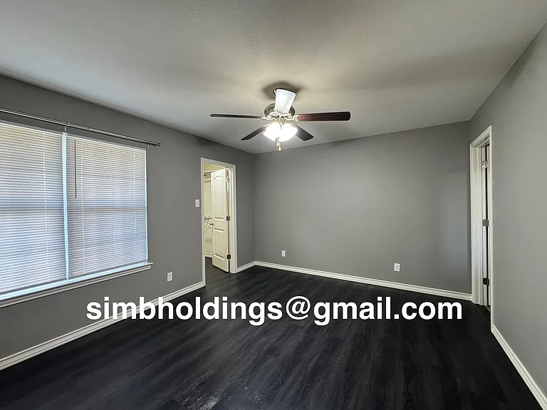 Master bedroom with walk-in closet and en suite bathroom