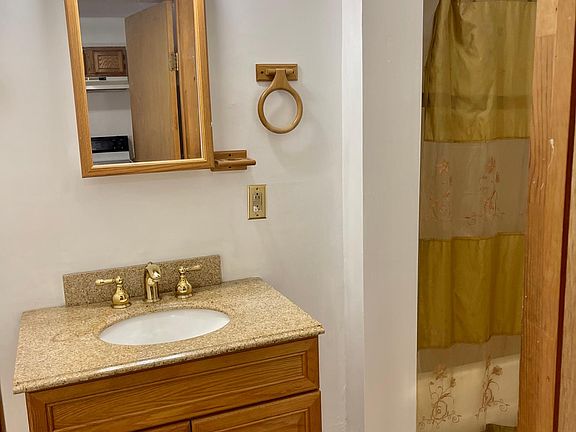 bathroom with linen closet