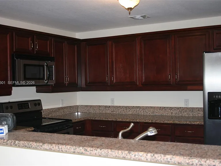 5271 SW 8th St #216 — Photo 4