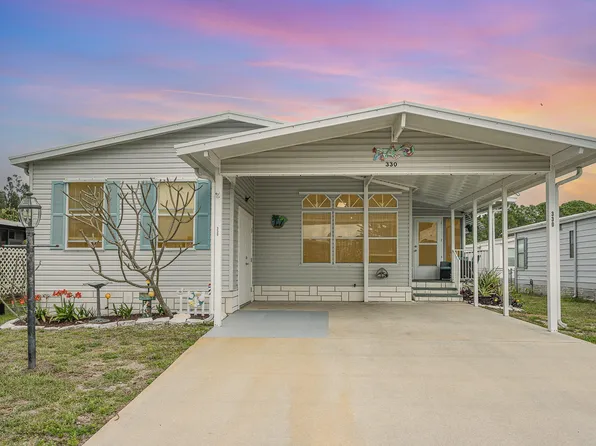 330 Kiwi Dr, Barefoot Bay, FL 32976