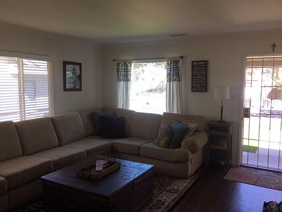 Living Room, newly finished origional hardwood flooring and 