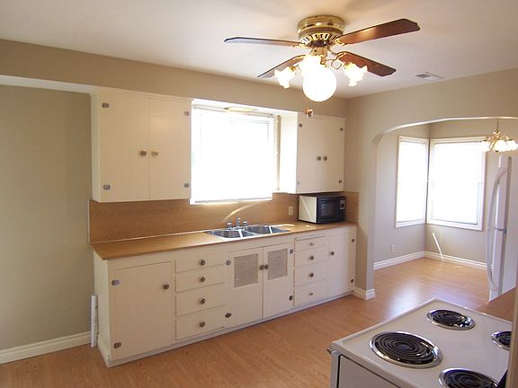 Roomy kitchen w/built-ins and lots of cabinets.