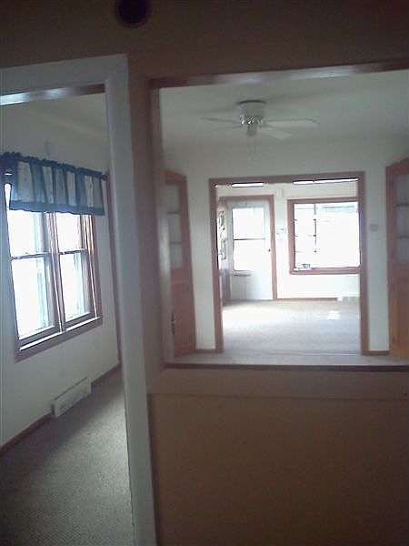 From kitchen thru dining room to living room