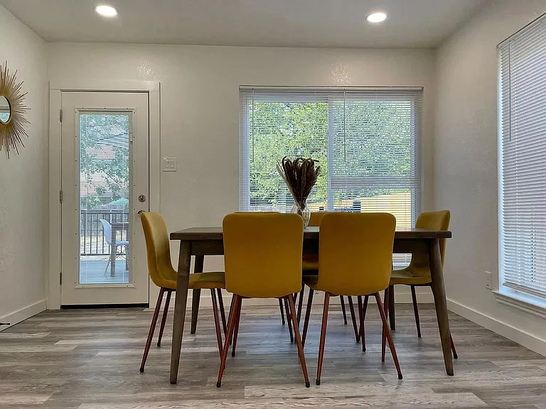 Dining area overlooking the beautiful backyard!