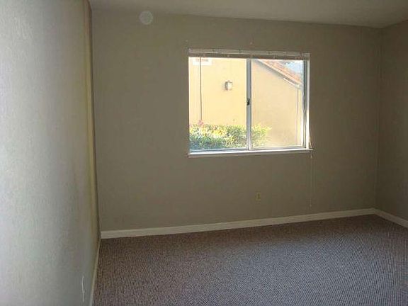 Back room with window, providing natural light.