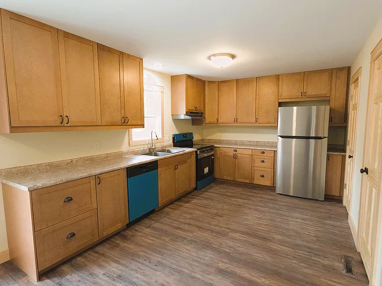 Remodeled Kitchen with new cabinets and appliances.