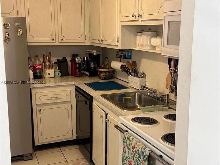 447 NE 195th St #310 — Photo 15
