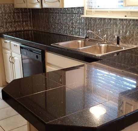 kitchen with fancy backsplas