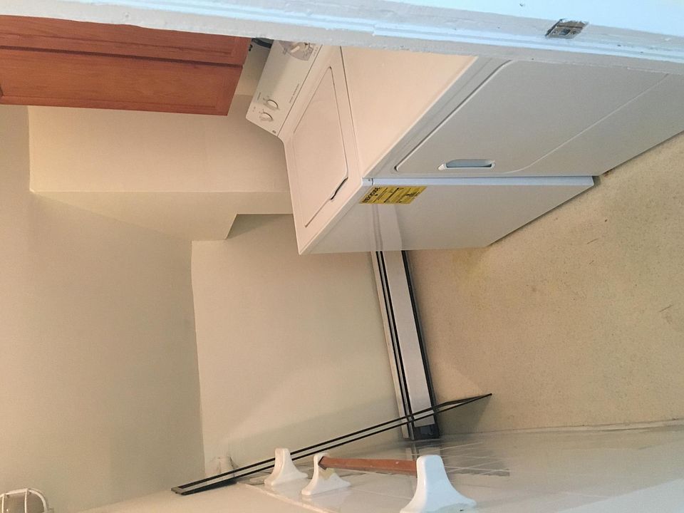 Washer and Dryer next to master bathroom.