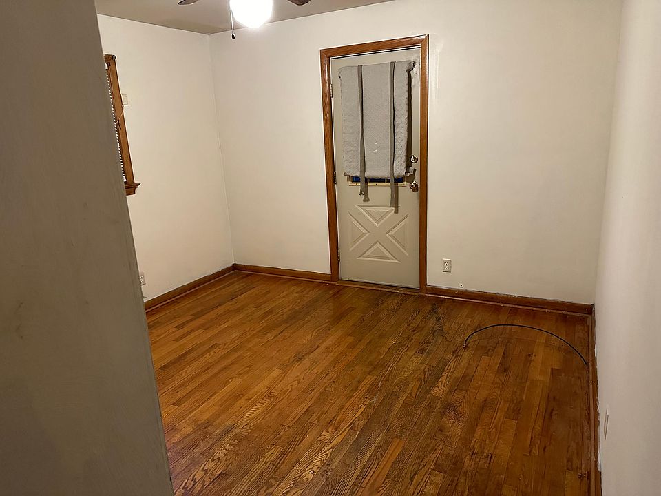 Bedroom upstairs the door opens to a 3 seasons sun room