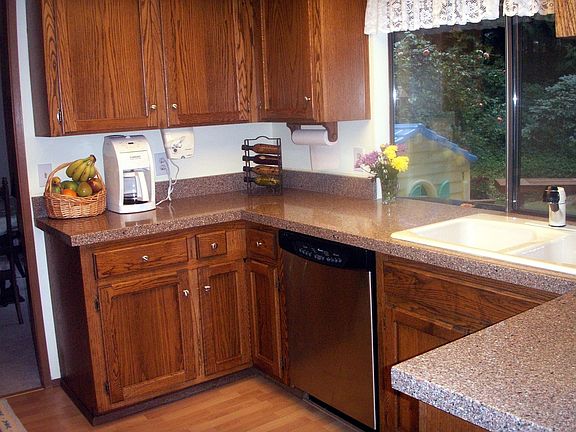 The Kitchen has new granite countertops and stainless steel appliances
