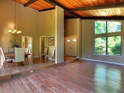 Living/Dining with vaulted wood-beam ceilings