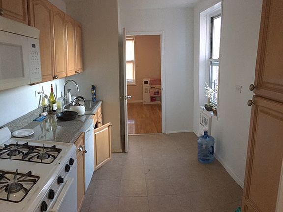 3rd image of 56-10 94th St #T5