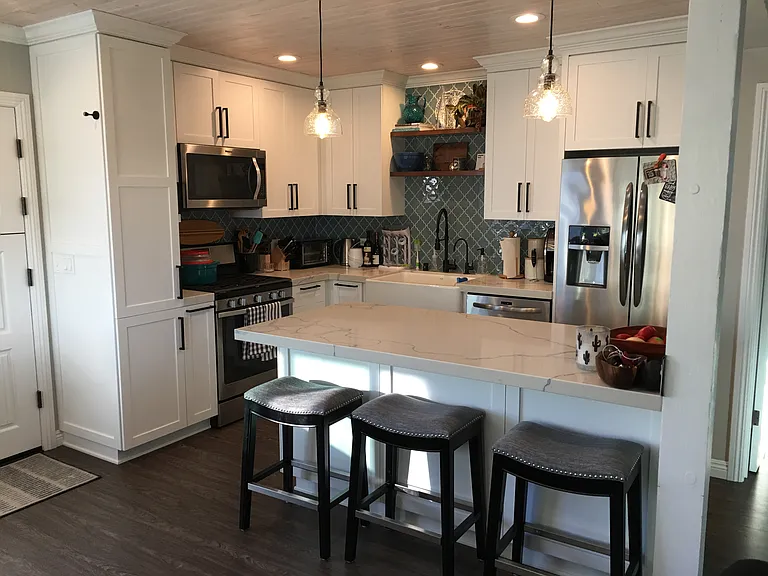 Canned lighting is found throughout this remodeled unit