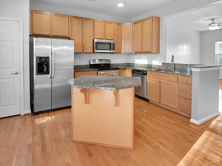Granite Island, Tons of Cabinets & a Dedicated Pantry