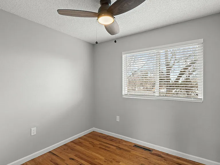 Embrace the simplicity of this bright and airy bedroom, perfect for creating your personal retreat. Embrace the simplicity of this bright and airy bedroom, perfect for creating your personal retreat.