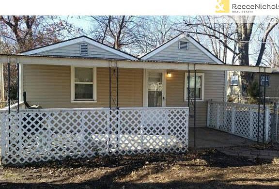 Back Covered Patio provides Shade w/Lattice Fence for privacy th