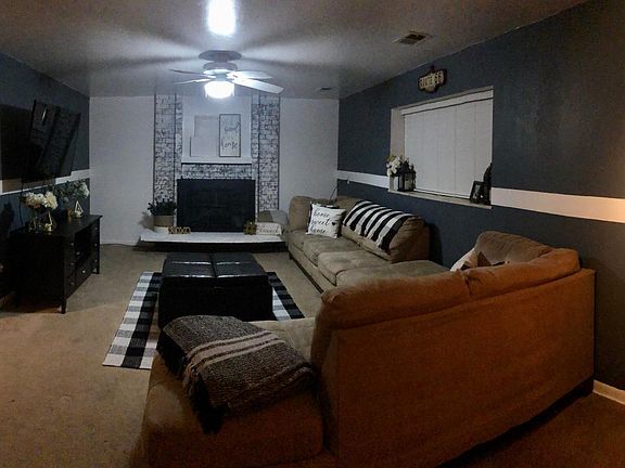 Downstairs family room area. TV not included but will leave the mount.