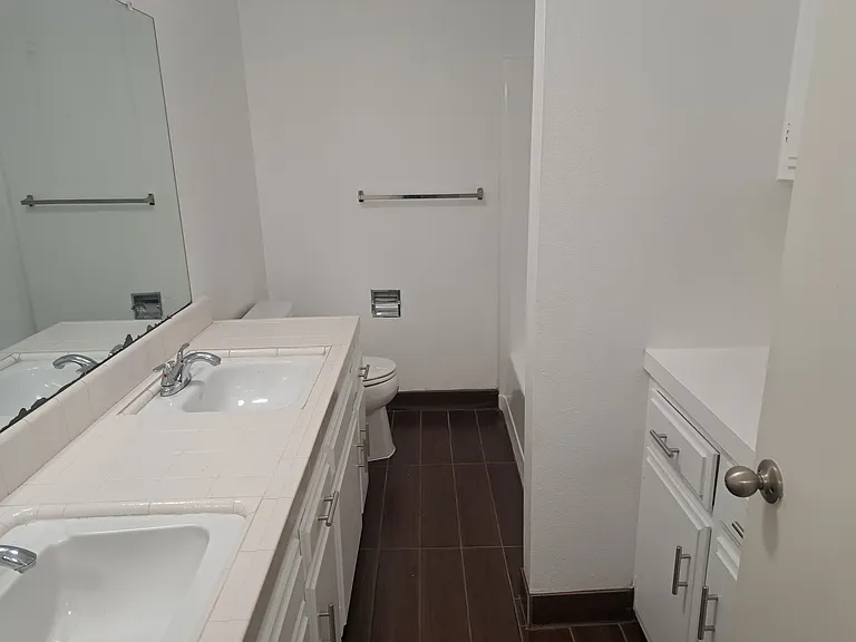 Upstairs bathroom featuring a tub and shower combination.