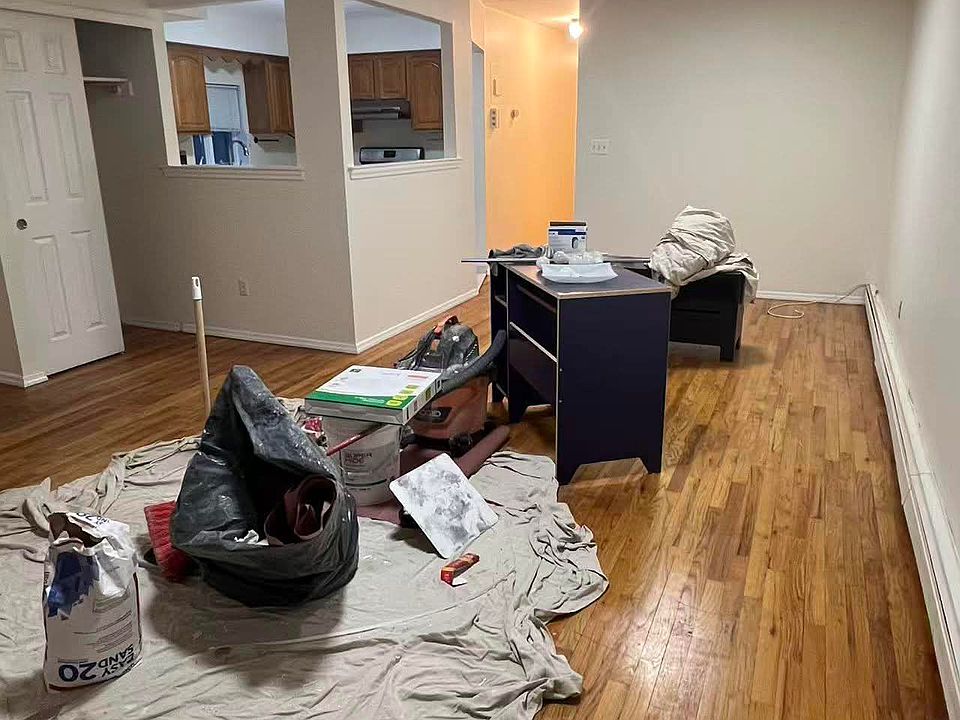 This is how big the living room is. Please excuse the mess here, we are still painting the walls here