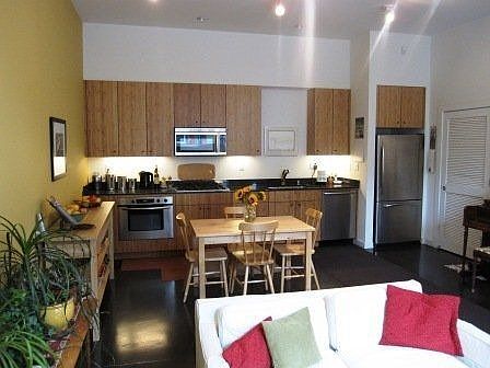 Living room open to kitchen and dining