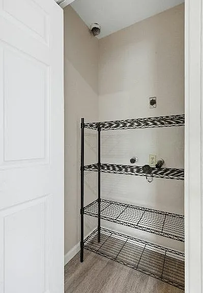 Pantry in the kitchen nex to the fridge