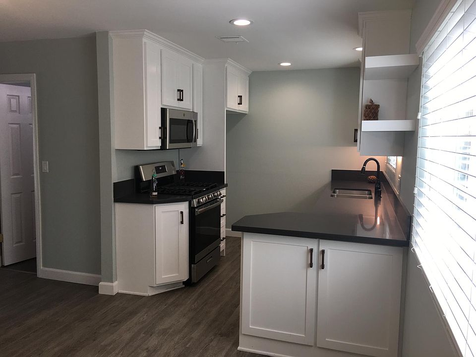 Beautiful new kitchen with lots of cabinets.
