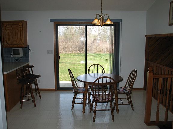 DINING ROOM W/DOOR TO PATIO