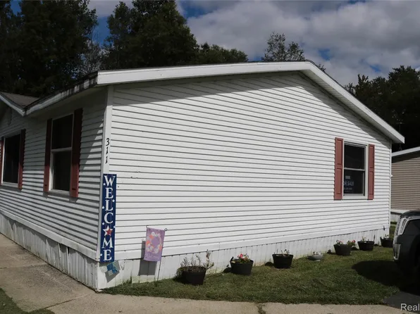 311 Peach Blossom Ct, Otisville, MI 48463
