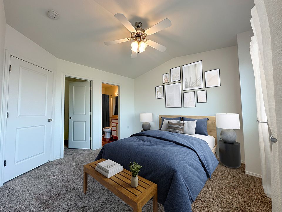 Liberty Hill Apartments, Draper, Utah, bedroom with a bed, nightstand, and a ceiling fan.