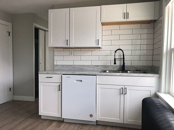 Remodeled kitchen with subway tiles