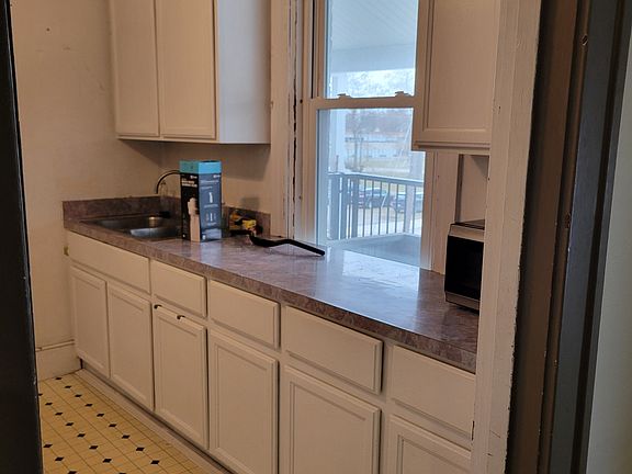 Lots of counter space in the galley style kitchen.