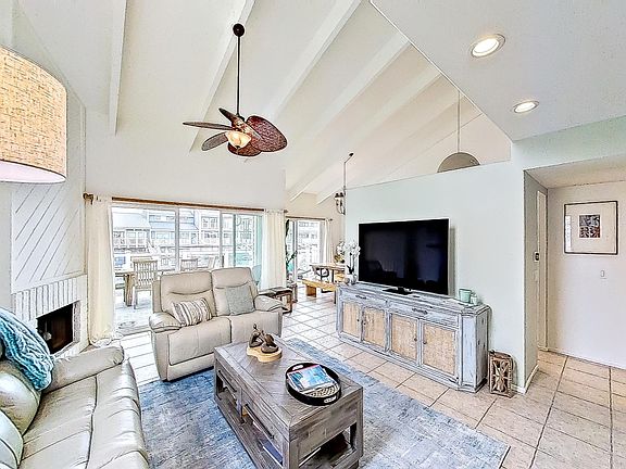 Living room with Smart TV for streaming your favorite shows. Reclining sofas for pure relaxation.