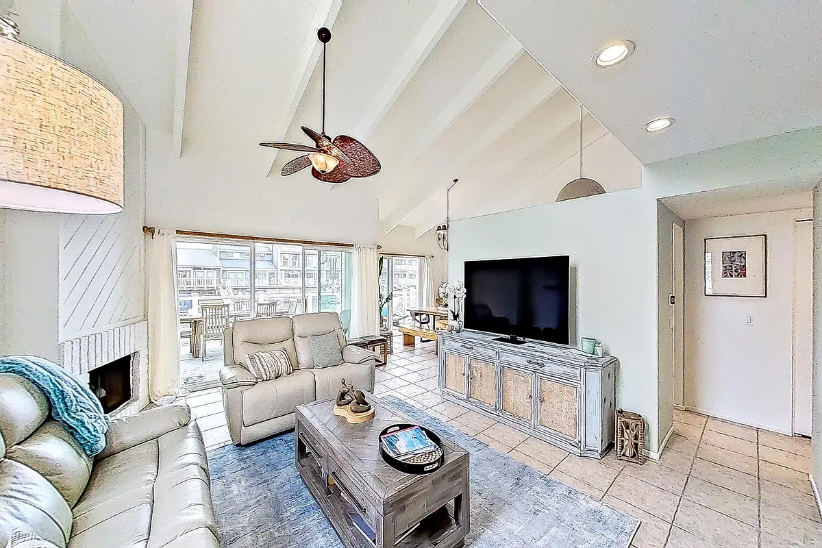 Living room with Smart TV for streaming your favorite shows. Reclining sofas for pure relaxation. - W Falkirk Bay