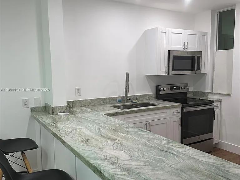 10210 Collins Ave #306 — Photo 10