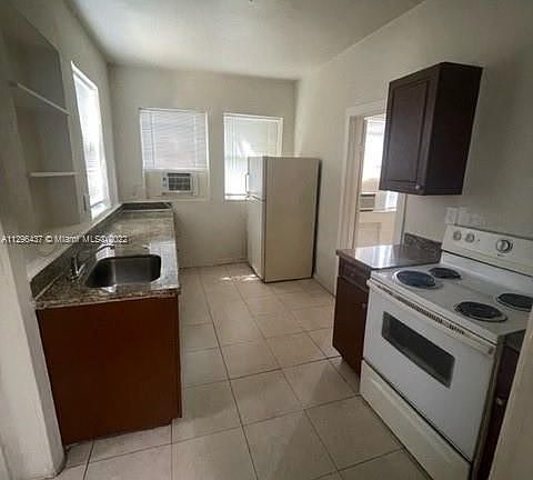 5th image of 1060 NW 47th St APT 7