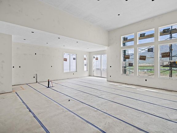 Great Room, Kitchen, Dining. Photos as of 5-12-2023