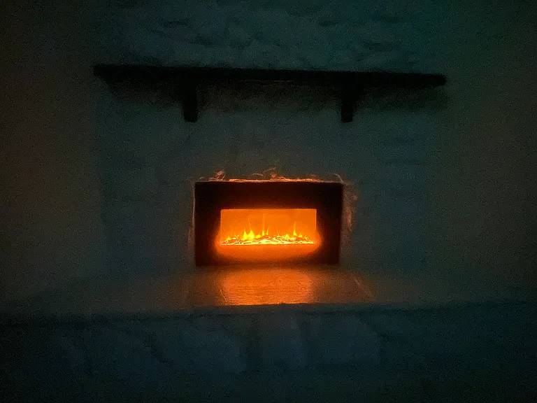 Warming fire ambiance from your easy to use and no maintenance fireplace.