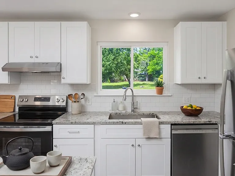 Window above sink while looking into your big backyard!