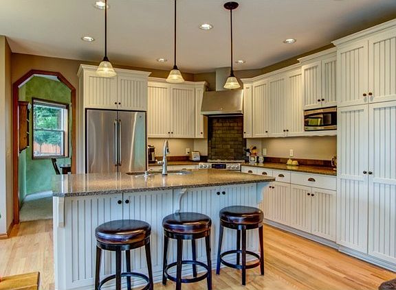 Updated kitchen with bead board cabinets, soft close drawers and