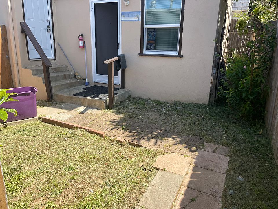 Small Fenced Yard in front of Door.