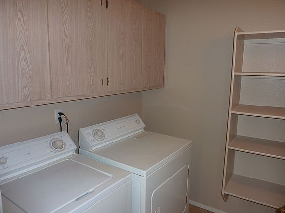 Tiled laundry/pantry, Washer and Dryer included.