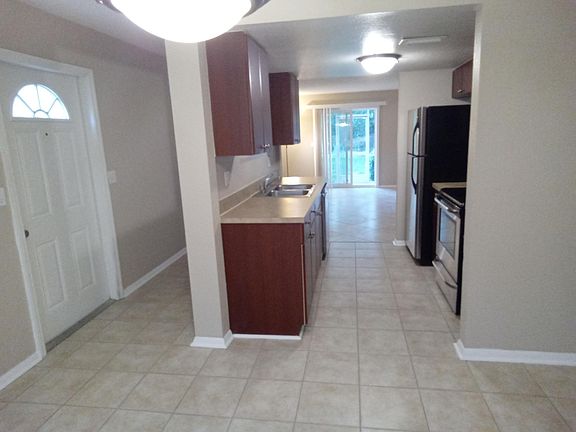 From dining room to kitchen from the front door