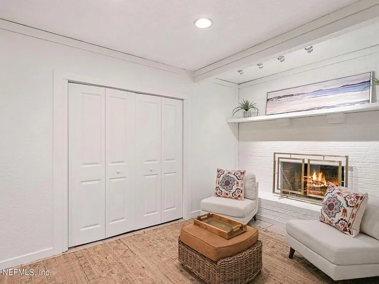 Sitting area with fireplace. Laundry available in closet (washer/dryer included in rental).